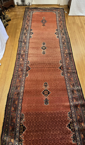 Long Oriental Runner. Orange/Red with Blue. 15' x 3' 4.5".