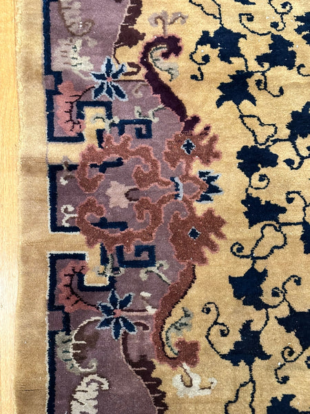 Chinese Area Rug. Beige Ground Purple Border. Circa 1920s. 7' 8" x 4' 5.5"