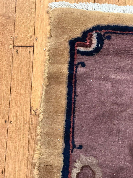 Chinese Area Rug. Beige Ground Purple Border. Circa 1920s. 7' 8" x 4' 5.5"