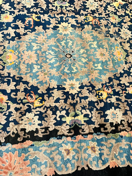 Chinese Area Rug. Dark Blue with Pink and Blue Border. Early 20th C. 6' x 8' 8"