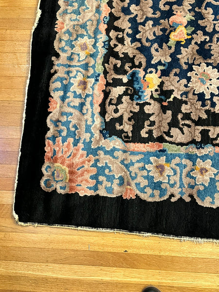 Chinese Area Rug. Dark Blue with Pink and Blue Border. Early 20th C. 6' x 8' 8"