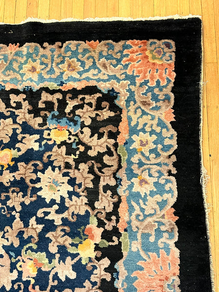 Chinese Area Rug. Dark Blue with Pink and Blue Border. Early 20th C. 6' x 8' 8"