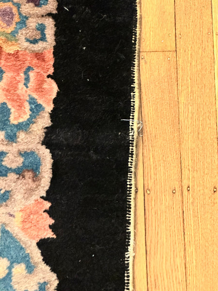 Chinese Area Rug. Dark Blue with Pink and Blue Border. Early 20th C. 6' x 8' 8"