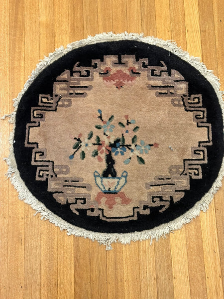 Small Circular Chinese Rug. Tan Gound, Black Border. Circa 1920s. 25" Diameter