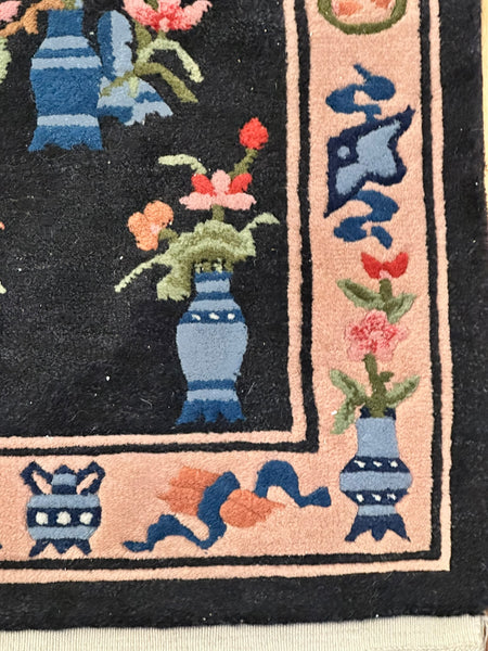 Small Chinese Rectangular Rug. Black Ground Pink Border. 3' 8" x 2' 1"