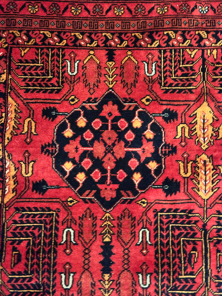 Caucasian Rug. Red with Black, Blue and Beige. Circa 1910. 6' 7" x 4' 11" (CABE)