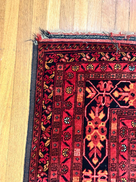 Caucasian Rug. Red with Black, Blue and Beige. Circa 1910. 6' 7" x 4' 11" (CABE)