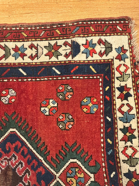 Rug. Afghan. Red Ground, Greens, Blues, White. Circa 1920. 50" x 44" (CABE)